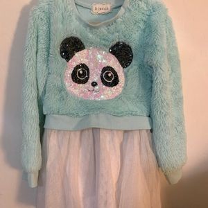 Light blue fuzzy dress or longer top, Tull bottom and sequins panda face.